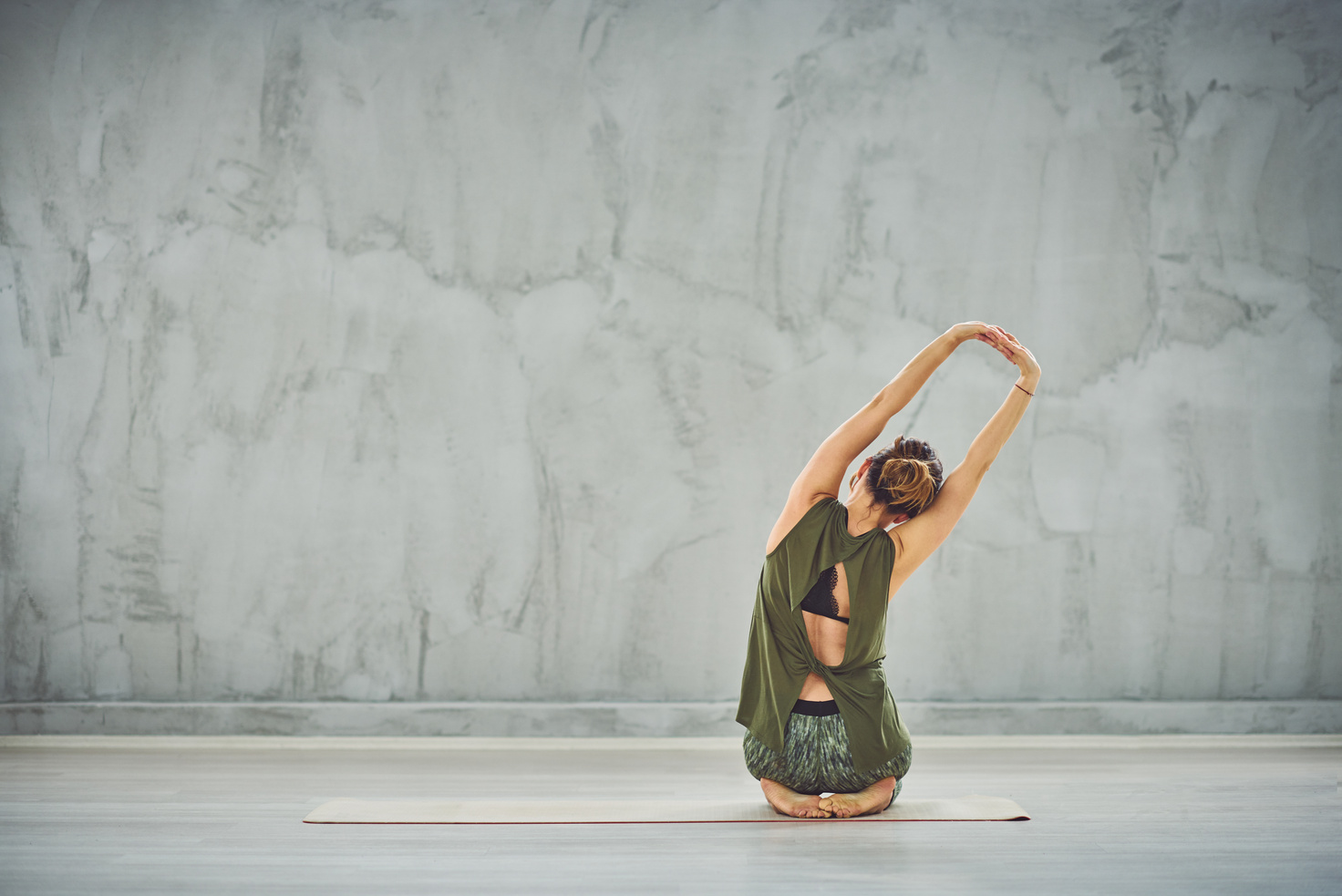 Woman practicing yoga.